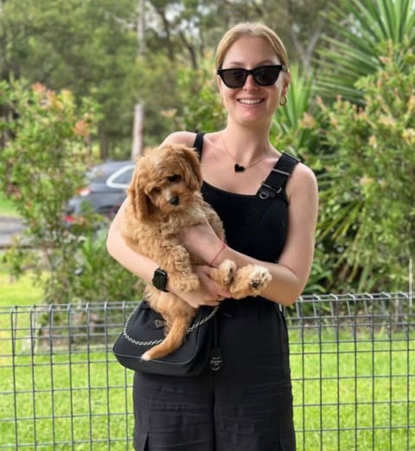 Photo of Charlotte Hayes with their Cavoodle