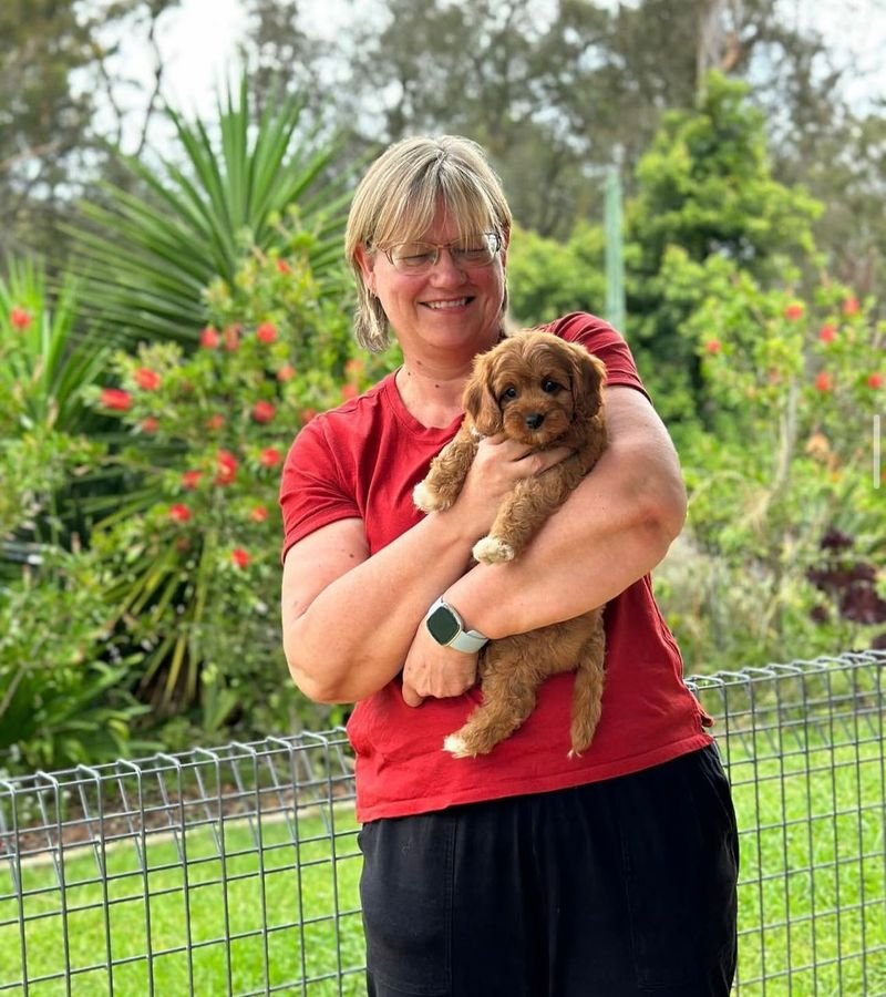 Photo of Emma Collins with their Cavoodle