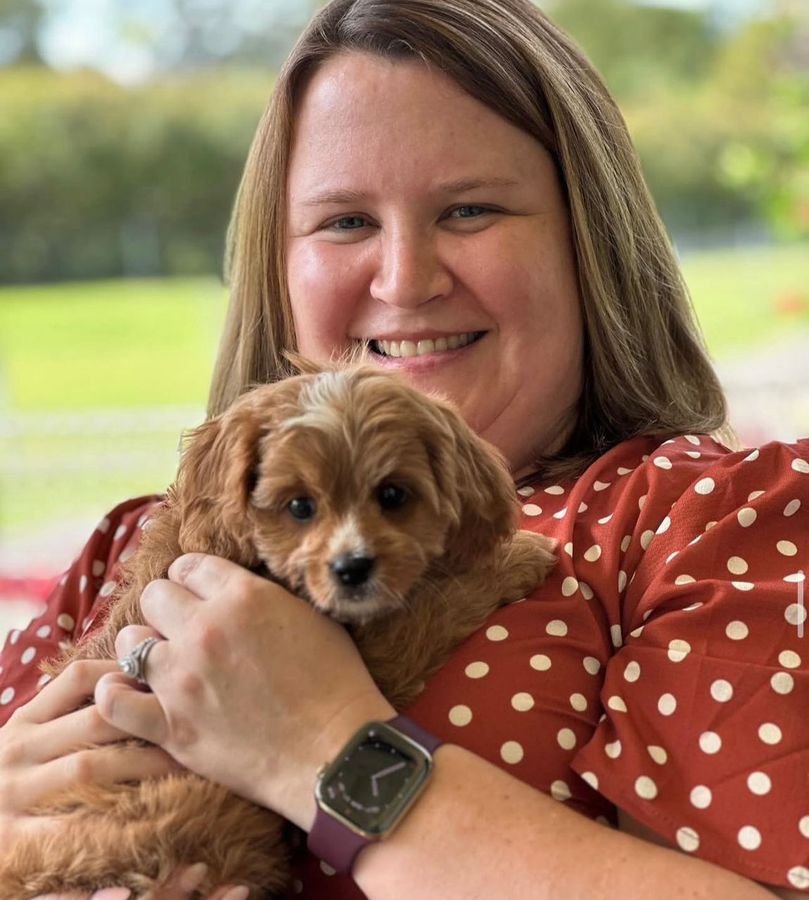 Photo of Isabella Clarke with their Cavoodle