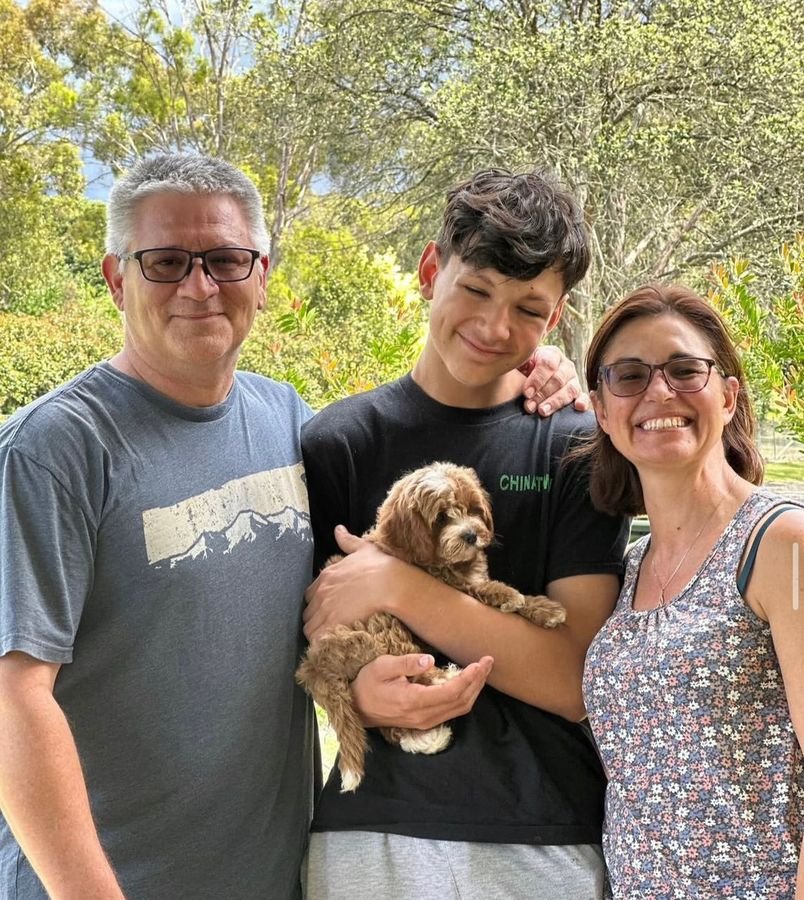 Photo of Miller Family with their Cavoodle