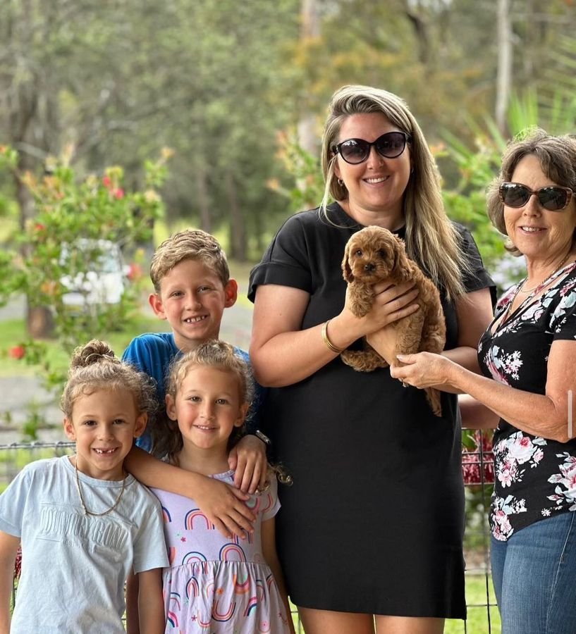 Photo of O'Connor Family with their Cavoodle