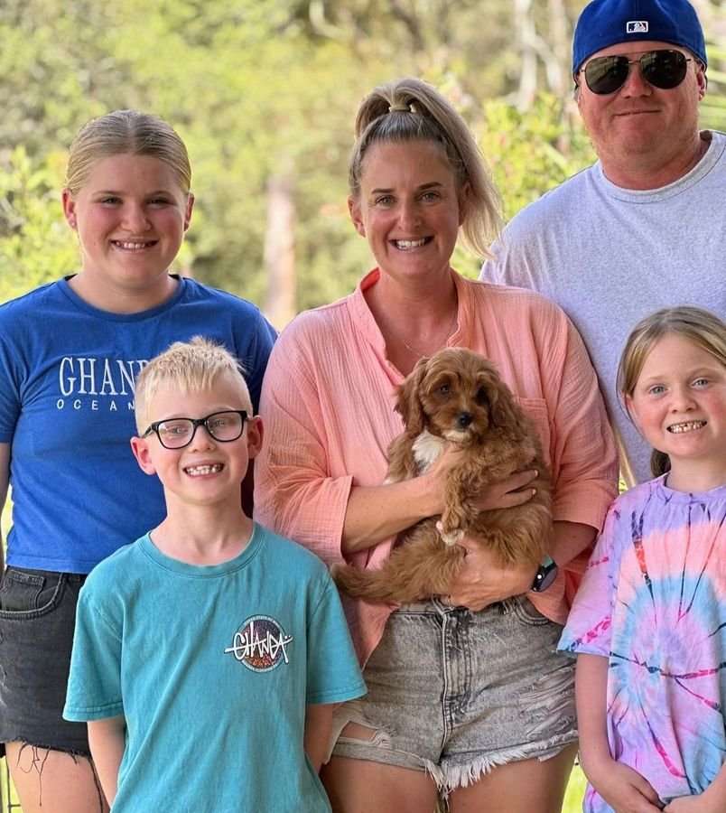 Photo of Thompson Family with their Cavoodle