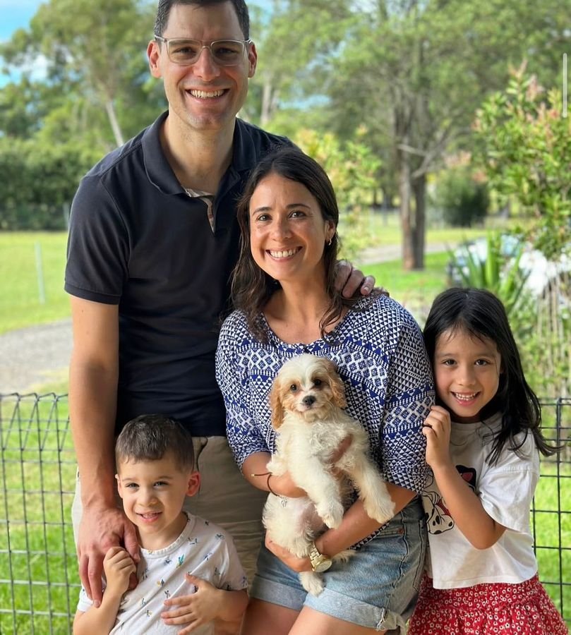 Photo of Walker Family with their Cavoodle